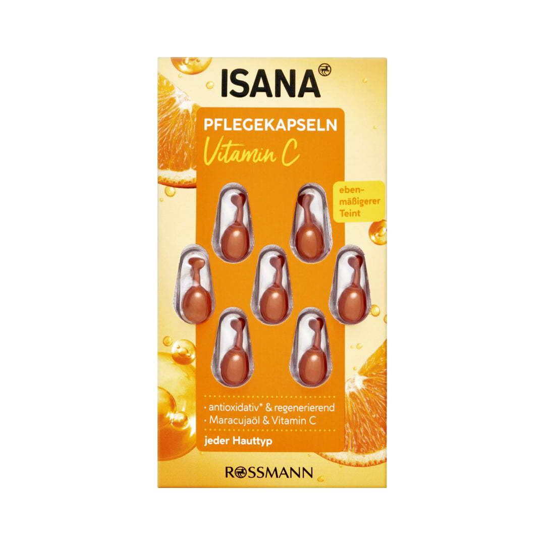 Packaging of ISANA Vitamin C capsules with orange slices on a white background